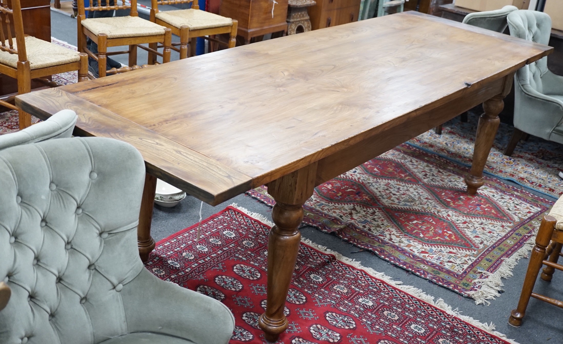 A Victorian style rectangular elm farmhouse table, length 272cm, depth 87cm, height 78cm